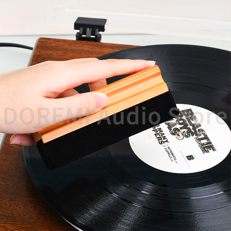 فرشاة تنظيف سجل الفينيل المضاد - مراجعة Vinyl Record Cleaner وسعره